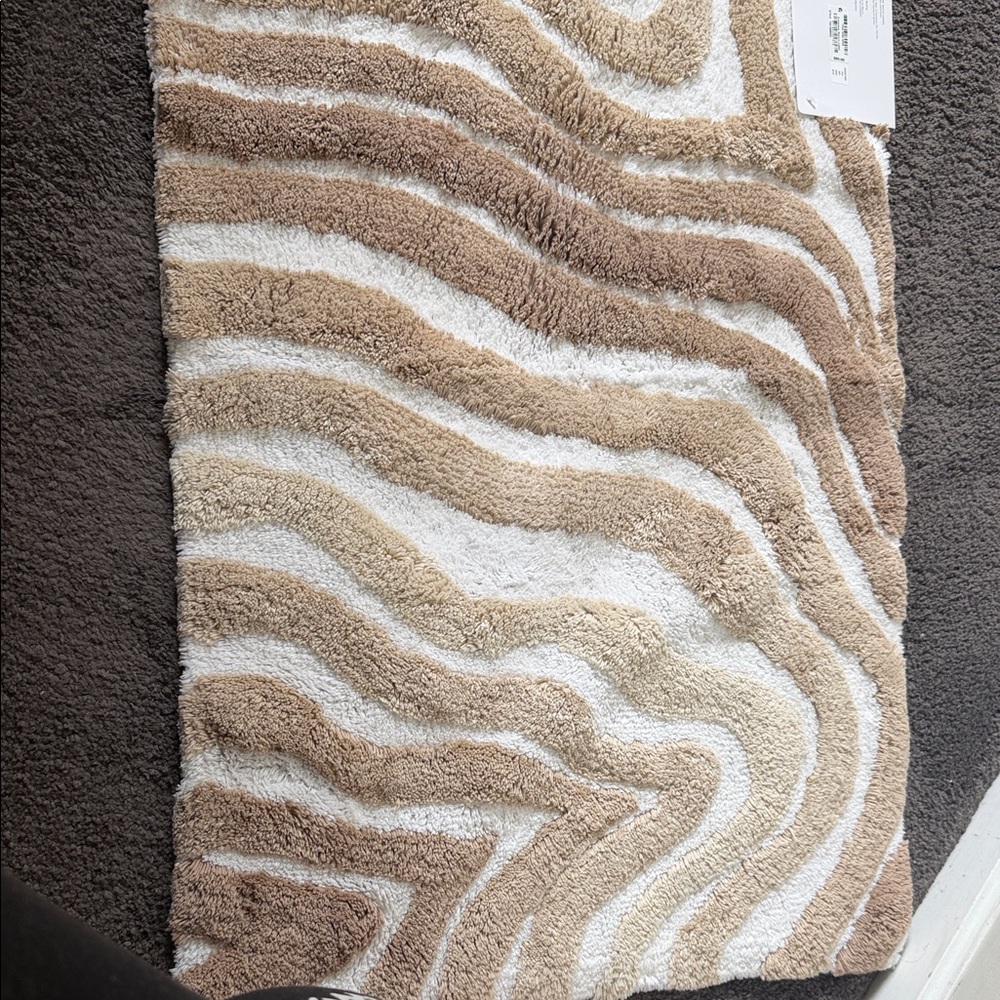 Hotel Collection Carved Marble Bath Rug in Beige and Cream. 2 rugs included